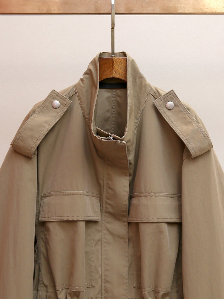 Shenzhen Nanyou high-end women's clothing autumn new French retro temperament workwear style stand-up collar drawstring trench coat for women